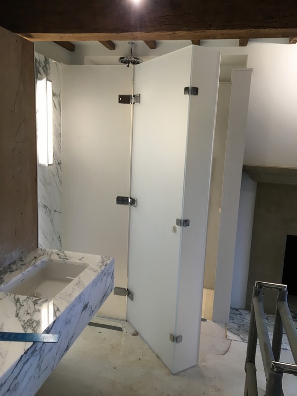Bespoke frosted glass shower enclosure in Southall luxury bathroom