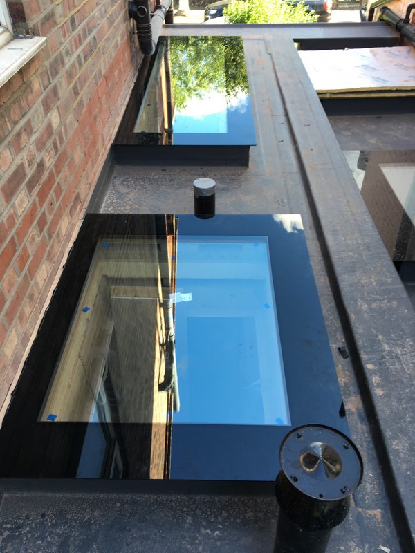 Multiple flat roof skylights on extension in Southall